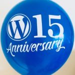 Blue balloon with WordPress logo and 15 Anniversary printed in white